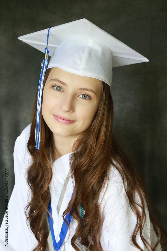 Graduation photographer offers graduation portraits and senior photo sessions in a beach, state parks or at home