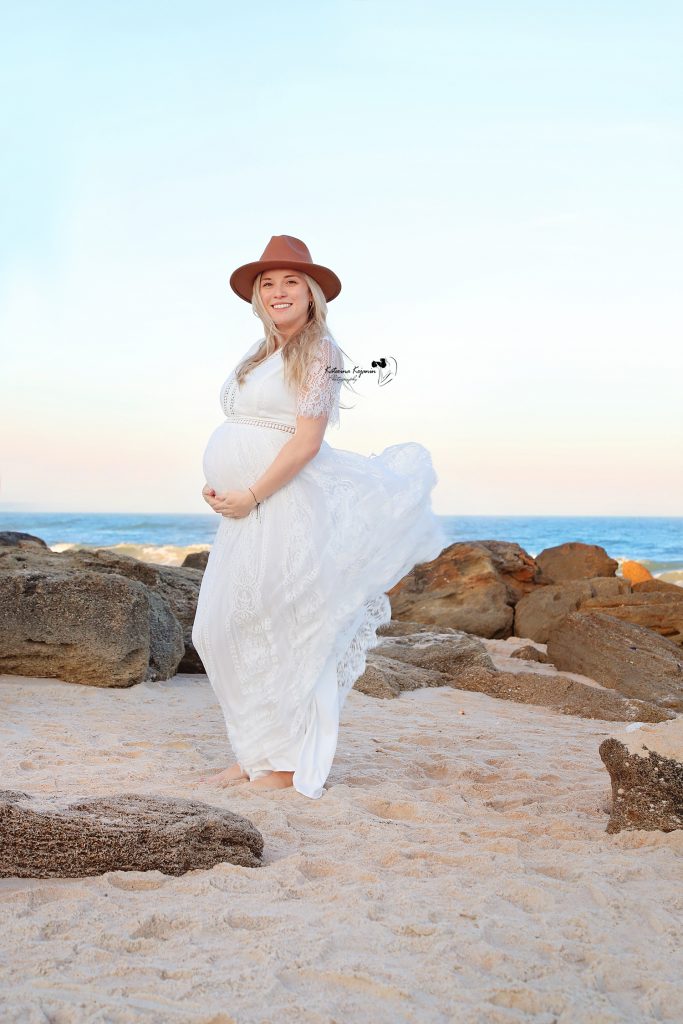 Maternity photography by Katerina Krjanina in Marineland Beach, Florida.