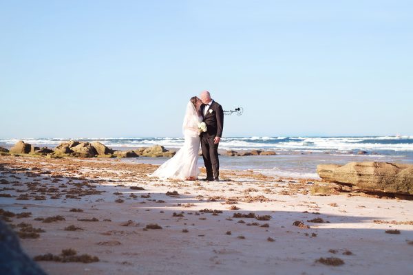 Professional wedding photography in Palm Coast featuring a joyful bride and groom on their wedding day.