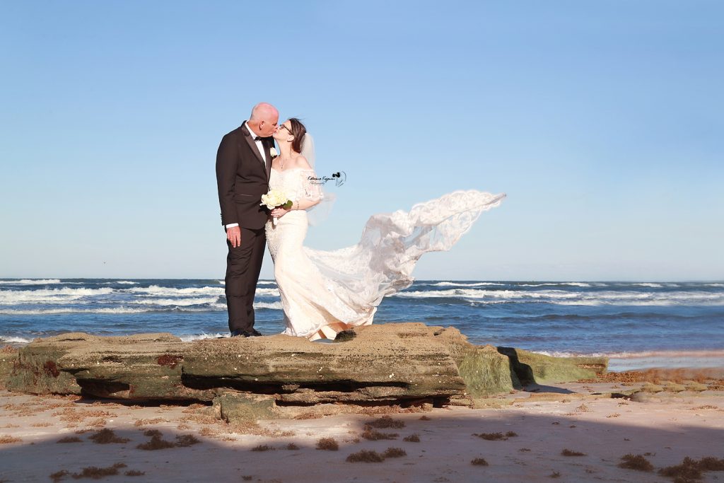 Professional wedding photography in Palm Coast featuring a joyful bride and groom on their wedding day.